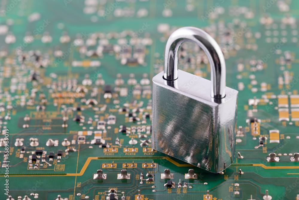 Poster computer security concept. silver padlock on green computer circuit board