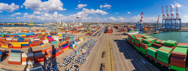 Shipping containers, Cargo Ship  And New Imported Cars in Port facilities in Ashdod, Israel,...