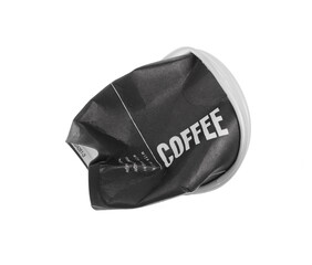 Naklejka premium Crumbled black paper coffee cup isolated on white background