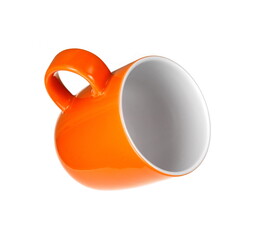 Orange empty coffee cup or coffee mug isolated on white background