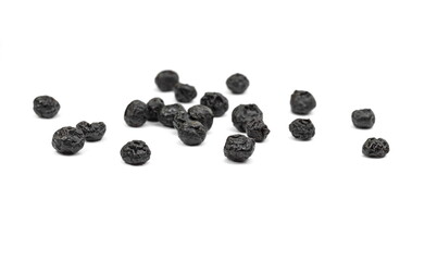 Dried aronia on a white background.