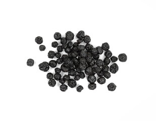 Dried aronia on a white background.