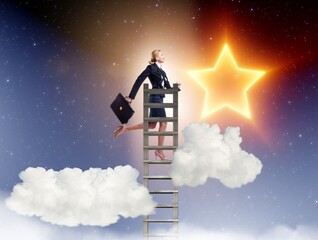 Businesswoman reaching out for stars in success concept
