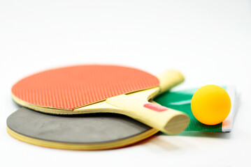 tennis racket and ping pong ball