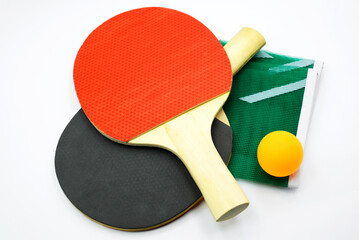 tennis racket and ping pong ball