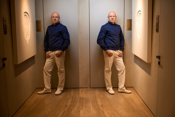 Double photo of a bald middle-aged man in modern interior