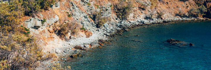 Kionia Beach swimming, the place to embrace the Aegean Sea, Tinos, Greece, banner size