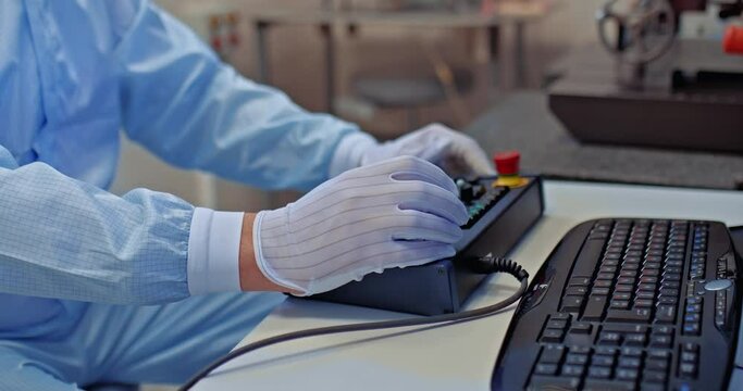 technician conducting scientific experiment in project laboratory, closeup of hands, 4K, Prores