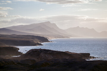 The west coast of Fuerteventura in the light fog as seen from the village of La Pared, Canary...