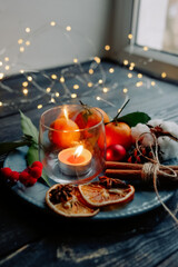 Christmas candle on a plate