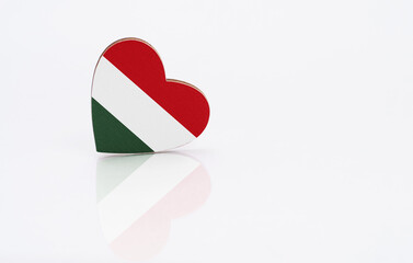 Flag of Hungary in the shape of a heart on a white background. The concept of patriotism. copyspace.