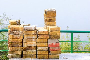 Stack of paving bricks for construction of pavement.