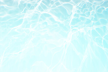 Defocus blurred transparent blue colored clear calm water surface texture with splash, bubble....