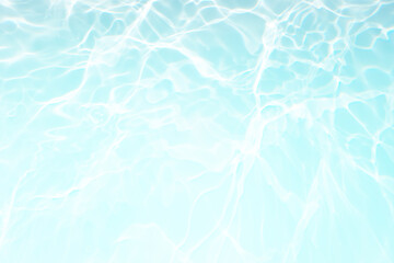 Defocus blurred transparent blue colored clear calm water surface texture with splash, bubble. Shining blue water ripple background. Surface of water in swimming pool. Blue bubble water shining.