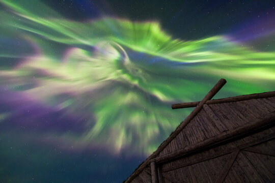 Northern Lights over boathouse at Norstead Viking replica village of Lanse Aux Meadows