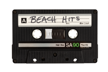 Isolated close up of a cassette tape labeled Beach Hits