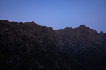 The mountain peaks in Madeira are kissed by the morning sun.