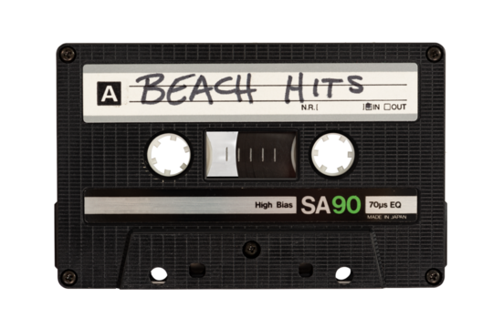 Isolated close up of a cassette tape labeled Beach Hits