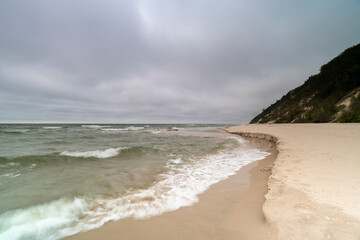 Natural landscape from the sea on a cloudy windy day.