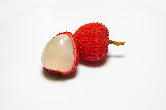 Ripe lychee fruit (Litchi chinensis) isolated in white background and selective focus. Macro