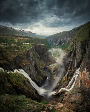 Landscape panorama of Voringsfossen waterfall in a valley at Hardangervidda National Park from above in Norway