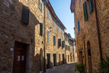 Fototapeta na wymiar San Quirico d'Orcia, Italy, 16 April 2022: View of the medieval town