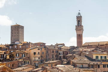Fototapeta premium Siena, Italy, 17 April 2022: Beautiful cityscape of the medieval historic center
