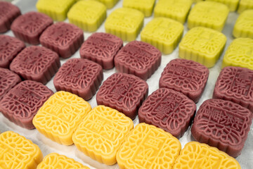 Sweet and salty traditional Chinese moon cakes with various fillings.