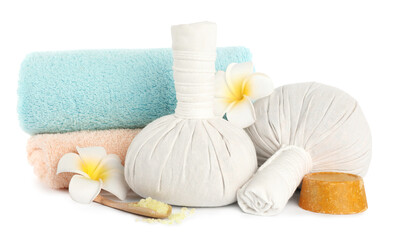 Obraz na płótnie Canvas Herbal massage bags and other spa products on white background