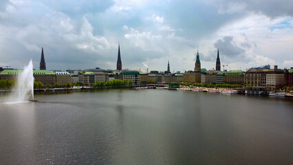 Fototapeta premium The beautiful city center of Hamburg with Alster River lake - aerial photography