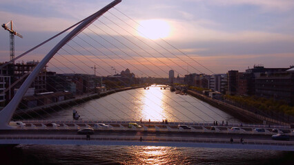 Fototapeta na wymiar Samuel Beckett Bridge over River Liffey in Dublin - aerial view by drone