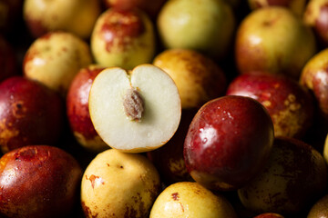 Chinese jujube or winter jujube on wooden table