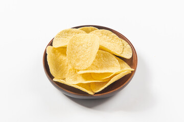 Pile of potato chips on white background.