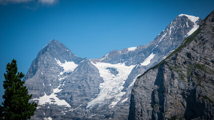 Wonderful view over the mountains Eiger Moench and Jungfrau in the Swiss Alps of Switzerland - travel photography