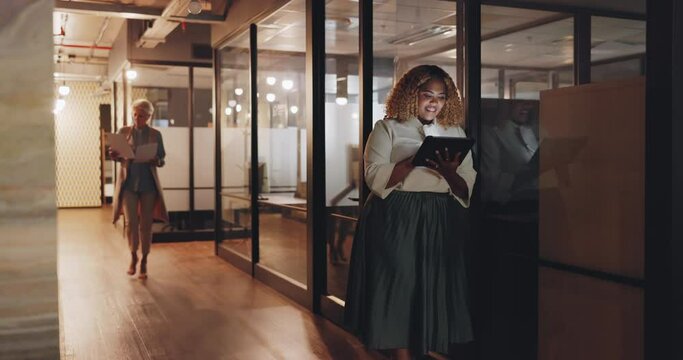 Tablet, working and hallway woman typing feedback review of social media website, news article or blog. Late night, office diversity and ceo hello to African girl using cloud computing database tech