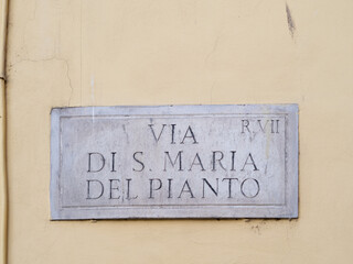 Street sign, "via di S.Maria del Pianto" in Rome, Italy, marble plate on wall.