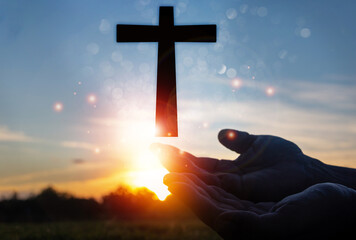 ็้็็Hands and cross  with sunset.She is so calm hope,respect,spiritual , crucifix,religion...