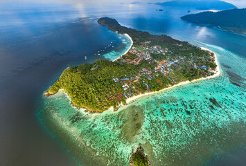 Aerial view of Sunrise beach with long tail boats in Koh Lipe, Satun, Thailand