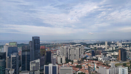 Naklejka na ściany i meble Aerial view of Singapore from CapitaSpring Building