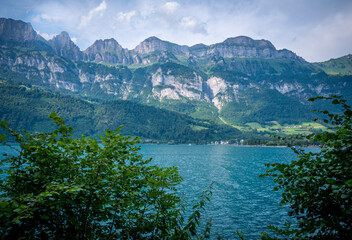 Naklejka na ściany i meble Beautiful blue water of Lake Walensee in Switzerland - travel photography