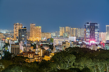 Fototapeta premium Ho chi minh at night view to city - there a alot of skyscraper, cityscape in the night, blue hour, see Bitexco tower. Travel concept