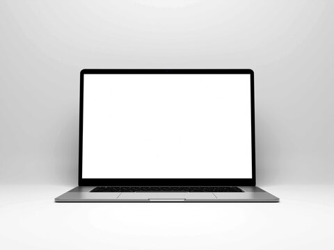 Laptop with blank screen isolated on white background, white aluminium body. Whole in focus. High detailed. Template, mockup.