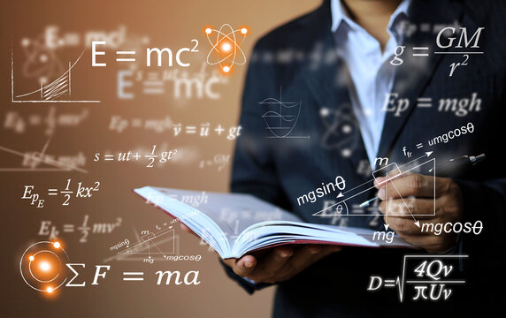 Physics equations floating in the background, hands writing in notebooks over the book, representing the learning teaching or scientific notes of Albert Einstein and Sir Isaac Newton or physics law.