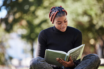 Black woman, reading book or nature park, garden or environment field in college, university or...