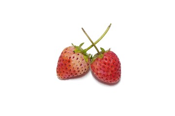 two red strawberries placed on a white background