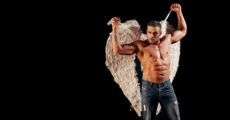 Sexy angel cupid man with angels wings and naked muscular body for Valentines Day.