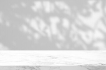 White Marble Table with Tree Branch Shadow on Concrete Wall Texture Background, Suitable for Product Presentation Backdrop, Display, and Mock up.