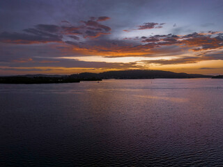 Obraz premium After the rain sunrise waterscape with clouds