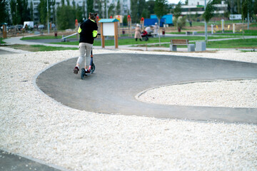pump track for kick scooters riding outdoors, sport activities