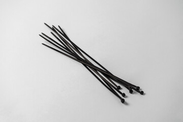 plastic black wire clamp bundle isolated